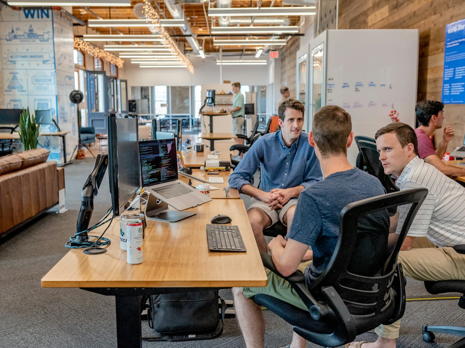 People collaborating in an open office